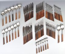 GEORGE BUTLER SHEFFIELD STAINLESS STEEL AND TEAK HANDLED CUTLERY SERVICE