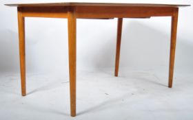 BELIEVED ALFRED COX FOR HEALS EXTENDING DINING TABLE