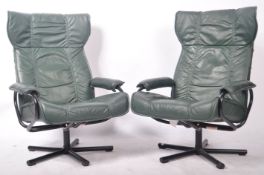 KEBE PAIR OF DANISH GREEN LATHER WINGBACK SWIVEL ARMCHAIRS