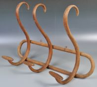 EARLY 20TH CENTURY BENTWOOD WALL MOUNTED COAT RACK IN TH MANOR OF THONET