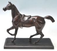 ANTIQUE 20TH CENTURY BRONZE RACING HORSE RAISED ON PLINTH BASE.