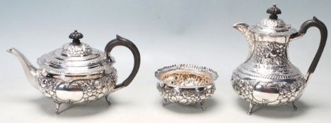 AN EDWARD VII SILVER TEA SET BY ATKIN BROTHERS SHEFFIELD DATED 1904 M