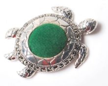 A STAMPED 925 SILVER PIN CUSHION IN THE FORM OF A TURTLE, SET WITH MARCASITES.