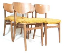 FOUR DANISH INSPIRED TEAK WOOD CHAIRS WITH CURVED BACKREST