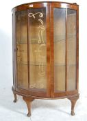 1950’S DEMILUNE WALNUT CHINA DISPLAY CABINET