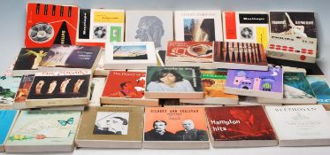 A LARGE COLLECTION OF REEL TO REEL TAPES