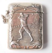 A STAMPED STERLING SILVER VESTA CASE WITH GOLF RELATED DECORATION.