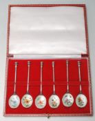 SET OF SIX 1975 SILVER HALLMARKED AND ENAMELLED COFFEE SPOONS IN A FITED CASE