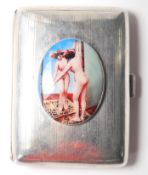 A SILVER HALLMARKED CIGARETTE CASE HAVING AN ENAMEL OVAL PANEL DEPICTING A NUDE STUDY.