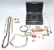 A VINTAGE JEWELLERY BOX COMPLETE WITH CONTENTS