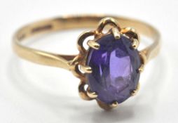 9CT GOLD AND PURPLE STONE RING