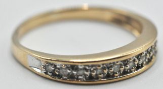 9CT GOLD AND WHITE STONE BAND RING