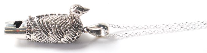 A STAMPED STERLING ENNGRAVES WHISTLE IN THE FORM OF A DUCK