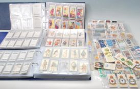 A LARGE QUANTITY OF VINTAGE CIGARETTE CARDS