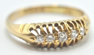 18CT GOLD FIVE STONE DIAMOND RING