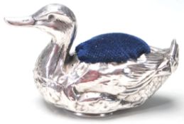 1921 SILVER HALLMARKED PINCUSHION IN SHAPE OF A DUCK WITH BLUE VELVET SOFT PAD