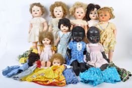 COLLECTION OF ASSORTED HARD PLASTIC DOLLS AND DOLL OUTIFTS