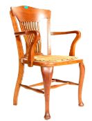 AN OAK VICTORIAN CAPTAIN CHAIR / DESK CHAIR.