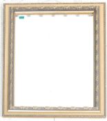 A contemporary antique style gilded wall mirror ha