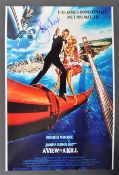 ROGER MOORE - JAMES BOND 007 - SIGNED 12X8