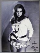 FROM THE COLLECTION OF VALERIE LEON - SIGNED 8X10