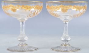 PAR OF BACARAT MANNER GILDED CHAMPAGNE GLASSES