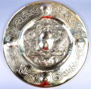 ARTS AND CRAFTS POLISHED BRASS WALL CHARGER