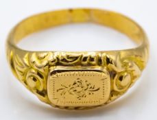 A French Antique Gold Signet Ring With Foliate Repousse Plaque