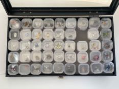 A large collection of cased Gem Collectorsspecimen gemstones