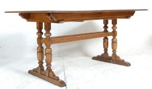 ERCOL LARGE DORCHESTER PATTERN ELM DINING TABLE