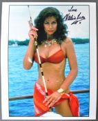 VALERIE LEON MEMORABILIA COLLECTION – SIGNED 8X10” JAMES BOND