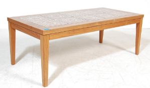 A VINTAGE RETRO 20TH CENTURY DANISH INSPIRED TEAK WOOD COFFEE TABLE WITH TILE TOP