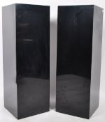 LARGE PAIR OF BLACK COMPOSITE DISPLAY COLUMNS