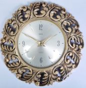 SMITHS RETRO WALL CLOCK IN GOLDEN SUNBURST FRAME