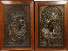 ARTHUR WAAGEN (GERMAN) 1833-1898.A SUPERB PAIR OF OAK FRAMED METAL BUSTS OF AN ARAB AND PRINCESS.
