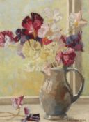 20th Century British School. A Still Life of Mixed Flowers in a Jug, Oil on Board, Signed U. V.