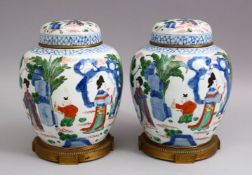 A GOOD PAIR OF 19TH / 20TH CENTURY CHINESE DOUCAI PORCELAIN MOUNTED GINGER JARS & COVERS, The body