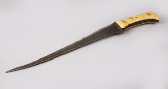 A 17TH / 18TH CENTURY INDIAN MUGHAL WALRUS IVORY HILTED DAGGER, with a watered steel blade, 37cm