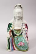 A 18TH / 19TH CENTURY CHINESE FAMILLE ROSE PORCELAIN FIGURE OF GUANYIN, in a knelt position