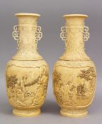 A GOOD FINE QUALITY HEAVY PAIR OF 19TH CENTURY CHINESE CARVED IVORY VASES, the body of the vases