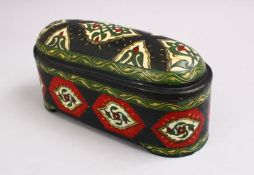 AN ISLAMIC ENAMEL COPPER LIDDED BOX, decorated with formal foliage decoration, 21cm wide.