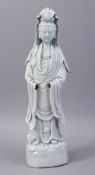 A GOOD 19TH CENTURY CHINESE BLANC DE CHINE PORCELAIN FIGURE OF GUANYING, 35cm high.