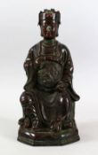 A GOOD CHINESE 19TH / 20TH CENTURY BRONZE FIGURE OF A SEATED EMPEROR, the bronze modeled seated with