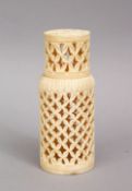 A GOOD 19TH CENTURY CHINESE CARVED IVORY OPENWORK CRICKET CAGE, 9.6cm high x 4cm.