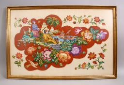 A LARGE CHINESE NEEDLEWORK FRAMED PICTURE, depicting figures playing instruments in landscape