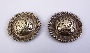 TWO OTTOMAN OR INDIAN WHITE METAL SHEILD SHAPED BOSSES, 5.5cm diameter each.