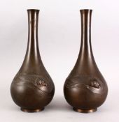 A GOOD PAIR OF JAPANESE MEIJI PERIOD BRONZE RELIEF CARP VASES, the body of both bottle shaped