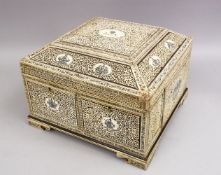 A FINE QUALITY 19TH CENTURY INDIAN CARVED IVORY CASKET / SEWING / VANITY , the casket carved with