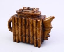 A CHINESE BAMBOO CARVED SOAP / HARD STONE TEA POT AND COVER, 10CM X 16CM.