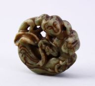 A GOOD CHINESE CARVED JADE ROUNDEL PENDANT OF GUANYIN, the pendant carved to depict guanyin, 5.5cm